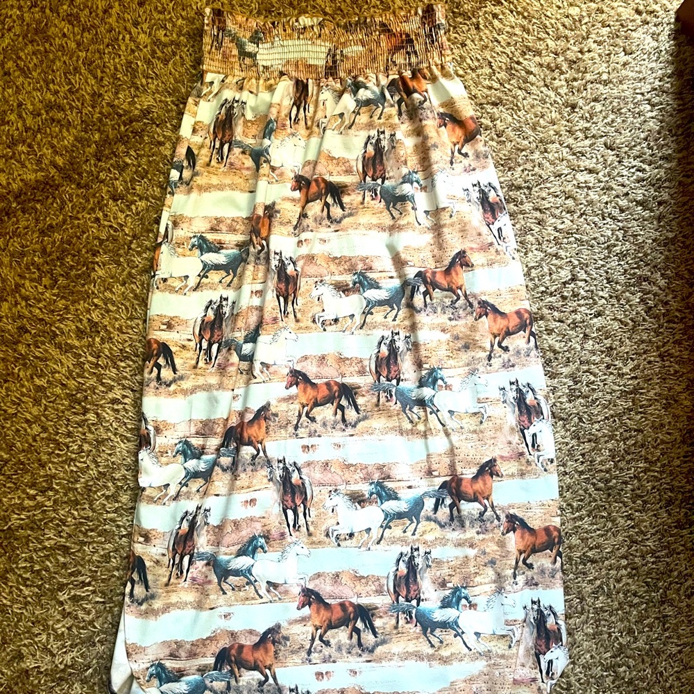 Size Medium Runnin Horse maxi skirt with side slits.